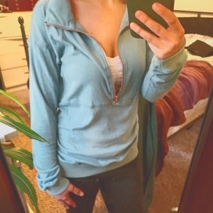 Teal pullover with rose gold zipper